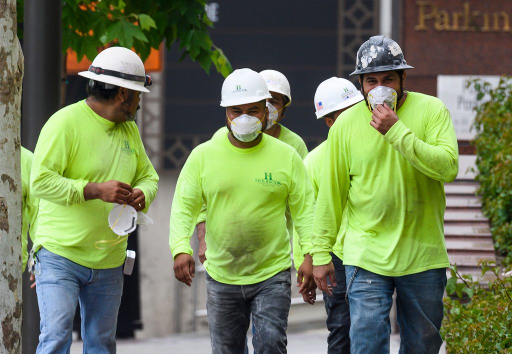 Outdoor Crews Absorb the Highest Smoke Doses, and Respirator Fit Decides How Much Protection They Get